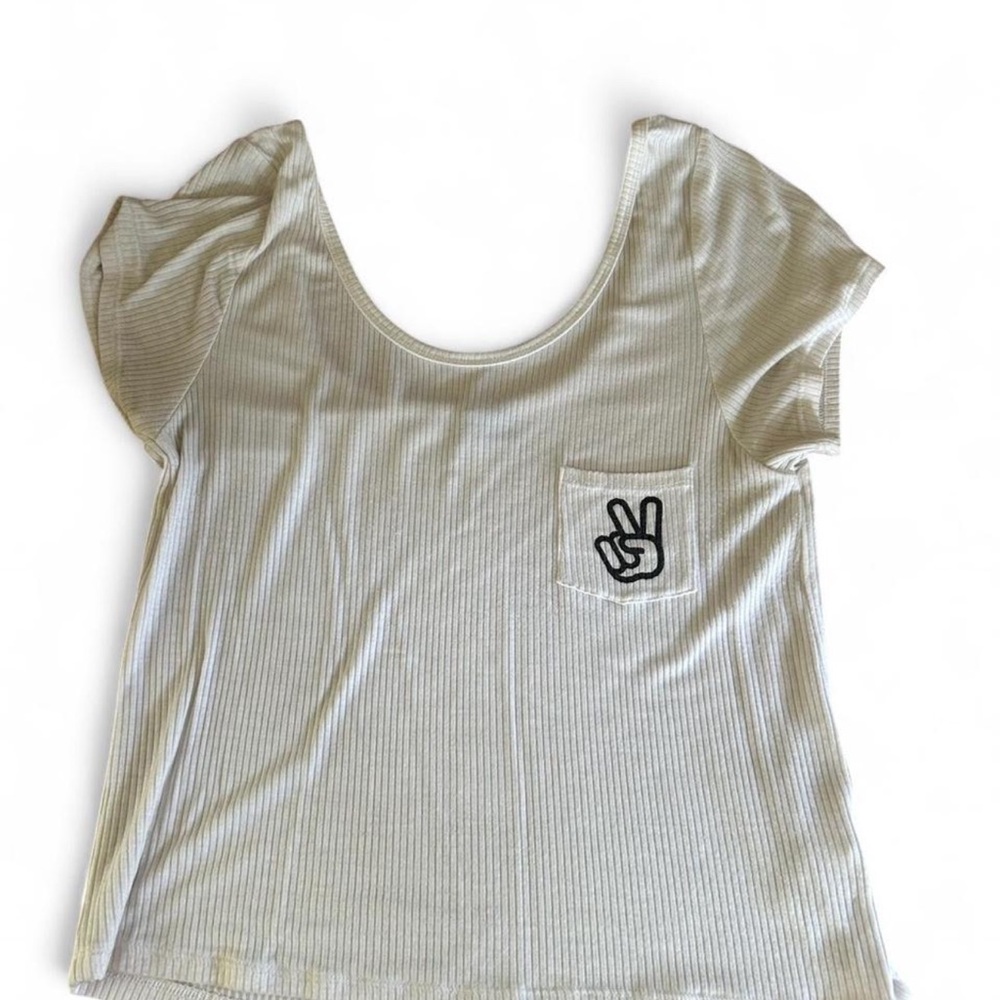 Trendy Cream Crop Top with Peace Sign Pocket